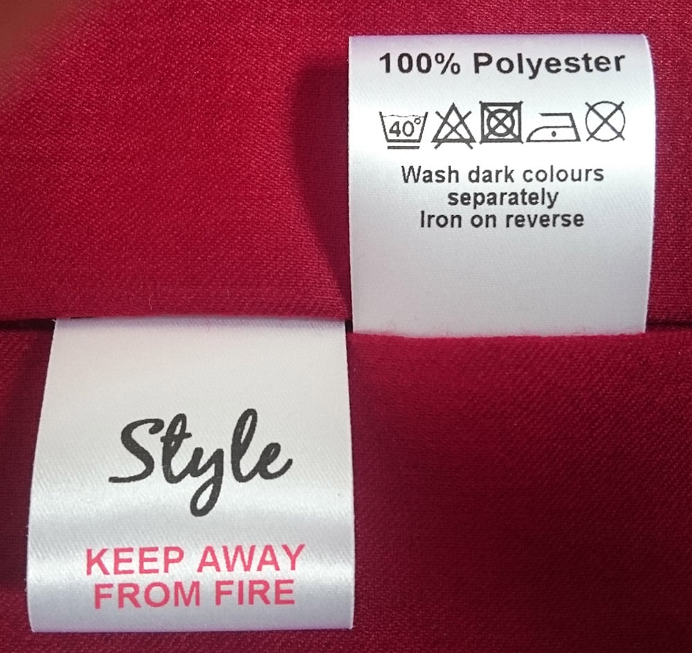 A sample of fabric clothing care labels
